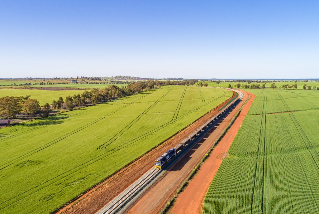 Inland Rail train travelling across country.